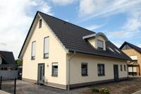 Zweifamilienhaus, Haus mit Einliegerwohnung in NRW, Tonnendachgaube, Zink Verkleidung Giebelseiten und Traufenseiten