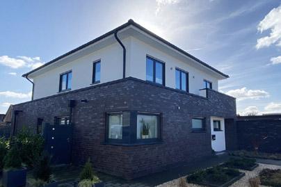 2-Familienhaus, Stadtvilla als Staffelgeschoss in Warendorf, NRW, KfW Effizienzhaus, Balkon, Dachterrasse, Erdwärmepumpe