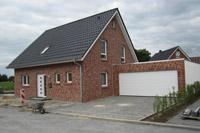 Massivhaus Hausbau in Ladbergen NRW, Doppelgarage, Erdwärmepumpe mit Tiefenbohrung, Effizienzhaus 70 Bauweise