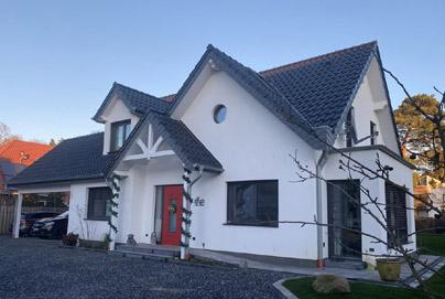 Einfamilienhaus mit Doppel-Carport-Anlage mit Satteldach, amerikanischer - hollndischer Landhaus-Stil, Neubau Osnabrck Lotte