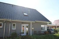 Doppelhäuser in Münster, Solarsiedlung, Solaranlage für Warmwasser- und Heizungsunterstützung, Schleppgaube