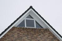 Massivhaus Saerbeck, Emsdetten, Ladbergen, Panorama Dreieckfenster, Dreieckgaube, Dachschleppe, Säulen, Erdwärme