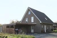 Einfamilienhaus Neubau in Lengerich NRW, Erdwärmepumpe, Tiefenbohrung, Effizienzhaus 70, Klinkerfassade, Carport