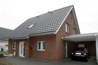Einfamilienhaus in Nordhorn, Dachschleppe, Erdwärme, Carport mit massivem Abstellraum, Bus System, Kamin