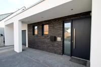 Designhaus zwischen Saerbeck und Greven, Garage integriert, Glattziegel / Flachdachziegel, Hagemeister DF, Überdachung