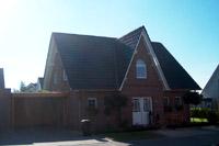 Friesenhaus Massivhaus bei Spelle, Hopsten, Recke, Rundbogenfenster, Mauerwerk - Klinker Verzierungen, Trapezgaube