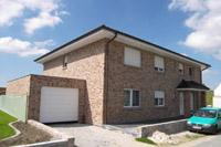 Haus mit Einliegerwohnung, Zweifamilienhaus Stadtvilla mit zwei Vollgeschossen in Lienen (Bad Iburg, Glandorf), Massivhaus