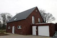 Niedrigenergiehaus Erdwärme bei Gronau (Ahaus, Ochtrup), ohne Dachüberstände, Kastenrinne, Fallrohr, Zink vorbewittert