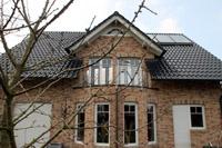 Klassisches Massivhaus in Drensteinfurt, Garage, Sprossenfenster, Balkon, Solaranlage, sichtbare Sparren (offen), Ofen