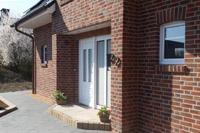 Landhaus in Ennigerloh, KfW Effizienzhaus mit Erdwärmepumpe, Tiefenbohrung, PV-Anlage, Doppelgarage, Kamin, Klinker