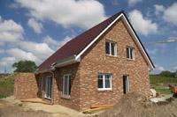 Landhaus in Lienen / Glandorf, Neubau Massivhaus, Friesengiebel, Erker, Erdwärme, Dreifachverglasung, Garage
