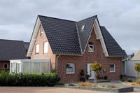 Friesenhaus Massivhaus in Bersenbrück, Ankum (Landkreis Osnabrück), Friesengiebel, Erdwärme, KWL mit WRG, KfW 55