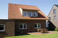 Landhaus in Greven (NRW, Münsterland), Teilkeller, Erdwärme, Schleppgauben, Sprossenfenster, Rundbögen über Fenster