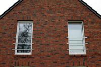 Niedrigenergiehaus Erdwärme bei Gronau (Ahaus, Ochtrup), ohne Dachüberstände, Kastenrinne, Fallrohr, Zink vorbewittert
