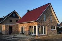Massivhaus, 100 qm Wohnfläche, Erdwärmepumpe in Reken, NRW, Eckfenster, Sprossenfenster, Klinkerfassade, Garage