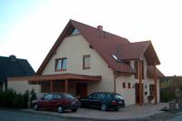 Massivhaus in Ascheberg (Lüdinghausen, Drensteinfurt, Selm), Säulen, Carport - Anlage, Erker, Sprossenfenster, Holzoptik