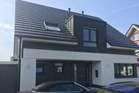 Modernes Haus mit Satteldach in Bottrop, 4-Giebel-Haus, Putz- Klinkerfassade, Anthra Zinc, Erdwärmepumpe, KWL mit WRG