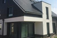 Modernes Haus mit Satteldach in Bottrop, 4-Giebel-Haus, Putz- Klinkerfassade, Anthra Zinc, Erdwärmepumpe, KWL mit WRG