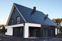 Modernes Satteldach Wohnhaus, Einfamilienhaus mit Satteldach, Klinker- Putz- Kombinationsfassade, Erdwärme, Terrassenüberdachung, Freisitz