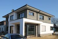 Moderne Stadtvilla bauen, massiv, Klinkerbauweise Putzbauweise in Kombination, überdachte Terrasse, überdachter Eingang, Garage, Modul-Klinker, Betonstein