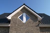 Erdwärmehaus in Erdwärmesiedlung Lengerich NRW, Rautenfenster, Ausbau mit Satteldach, Geräteraum, Dreifachverglasung