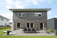 Massive Stadtvilla in Lienen, 2 Vollgeschosse, Erdwärmepumpe, Tiefenbohrung, Fußbodenheizung, Carport mit Geräteraum uvm.