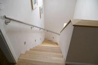 Massivhaus Osnabrck Wallenhorst, Betontreppe mit Holzstufen
