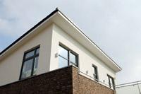 Stadtvilla Massivhaus Greven Emsdetten - Designhaus Pultdachhaus mit Garage im Keller (Souterrain Keller), Dachterrasse, Raffstoren / Raffstores