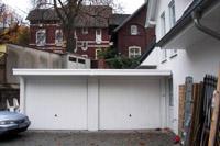 Walmdachvilla in Hamm, Bergkamen, Lünen, Unna - Balkon, Säulen, Fertiggaragen, Schornstein, Sprossenfenster, Kamin