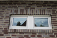 Massivhaus mit Erdwärmepumpe im Tecklenburger Land (Lengerich, NRW), 3-fach Glas, Fußbodenheizung, Eckfenster
